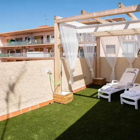 Апартаменты Espacioso Atico Con Piscina En С'Агаро